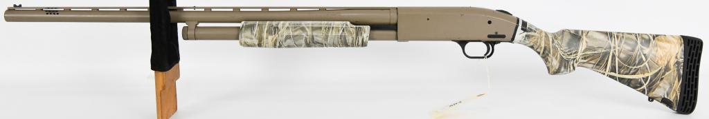Mossberg 500 Ported 12 Gauge Pump Shotgun: Up Next we have a Mossberg 500 Ported 12 Gauge Pump Shotgun, 28" Vent Rib Ported Barrel, Accu-choke, Accepts 2 3/4" & 3" Shells, Hi vis front sight Needs Fiber, Mid bead sight, Mossberg Advantage Max-