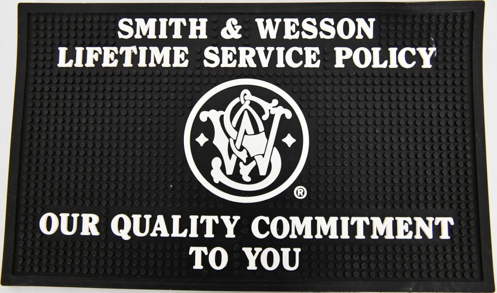 New Smith & Wesson Rubber Dealer Counter Mat: S & W LIFETIME SERVICE POLICY COUNTER MAT, Heavyweight with nubby topside protects both table surface and gun while cleaning. Great for cleaning your firearm., working on small items, and so much more