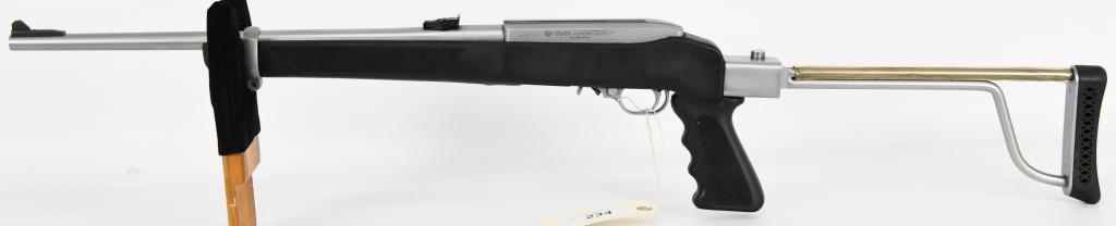 RARE AMT Lightning 25/22 Folder Rifle: This is an interesting gun a direct clone of the Ruger 10/22 designed to fit a 25 round magazine. It can Use Ruger & Butler creek mags. Also, the receiver is stainless steel rather than aluminum. This