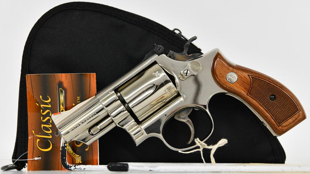 Pristine Smith & Wesson Model 19-3 Nickel .357 Mag: Up Next We Have a Beautiful and Pristine Smith & Wesson Model 19-3 in Nickel Finish, Chambered in .357 Magnum, 2 1/2" Pinned Barrel, Red Ramp Front Sight, Adjustible Rear, Recessed, Vibrant Case Color