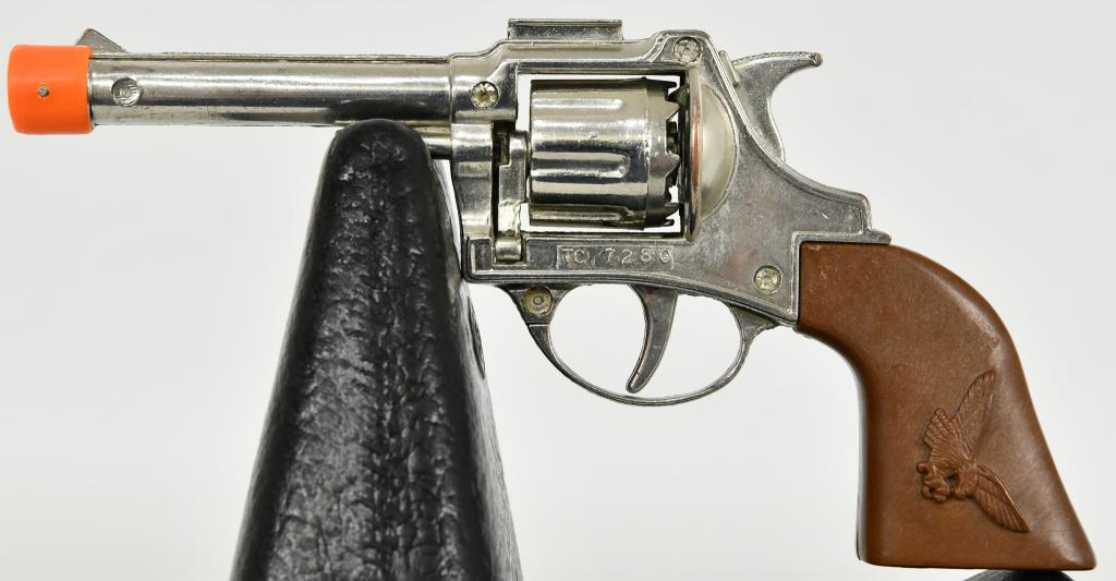Schylling Plastic Revolver Cap gun: Schylling Plastic Revolver Cap gun Die Cast Frame Marked TC 7280 In Overall Great Condition Measures 7" Overall Length