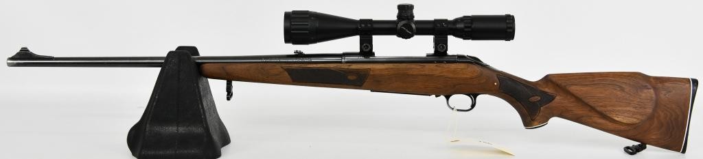 Revelation Model R210A Bolt Action .30-06 Rifle: Up Next We Have a Revelation Model R210A Bolt Action Rifle Chambered in .30-06 and Topped with a Center Point 4-16X50 Scope, Also Equipped with Front Sight and Flip up rear. Wood Stock Equipped with s