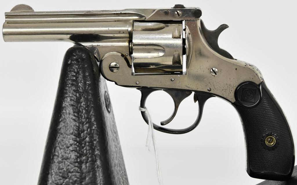 Harrington & Richardson Top Break Auto Eject .32: Up Next we have a Harrington & Richardson Top Break Auto Ejecting Revolver Chambered in .32 S&W, 6 Shot Cylinder. Original Grips With Target Scene, 3" Barrel.