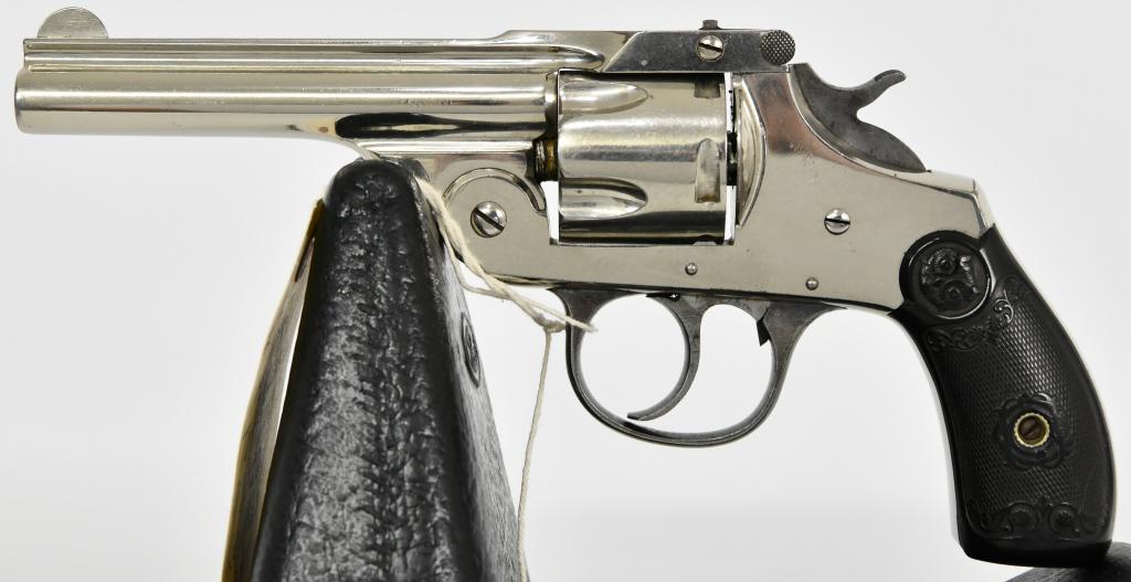 Iver Johnson Top Break Revolver .38: Here we have a Iver Johnson Top Break .38 5 shot revolver in Good condition, 4" barrel, Original grips with Owl head, Serial # 97077