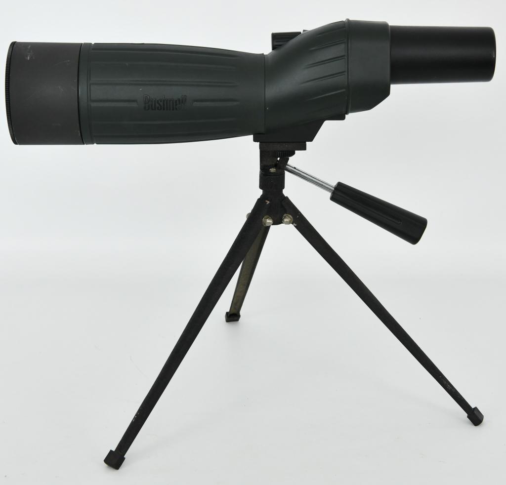 Bushnell Trophy XLT Spotting Scope 20-60x65mm: Bushnell Trophy XLT Spotting Scope 20-60x65mm Green/Black With Tripod comes with lens covers as well! Porro prism design. Premium multi-coated optics. Waterproof rubber armor construction. Compact tri
