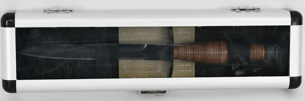 V-42 WWII Dagger Knife with Display Case: The V-42 Dagger was a stiletto and fighting knife first issued during World War II to the Joint Canadian / American Special Service Forces, "The Devil's Brigade." The V-42 combat knife first featured 