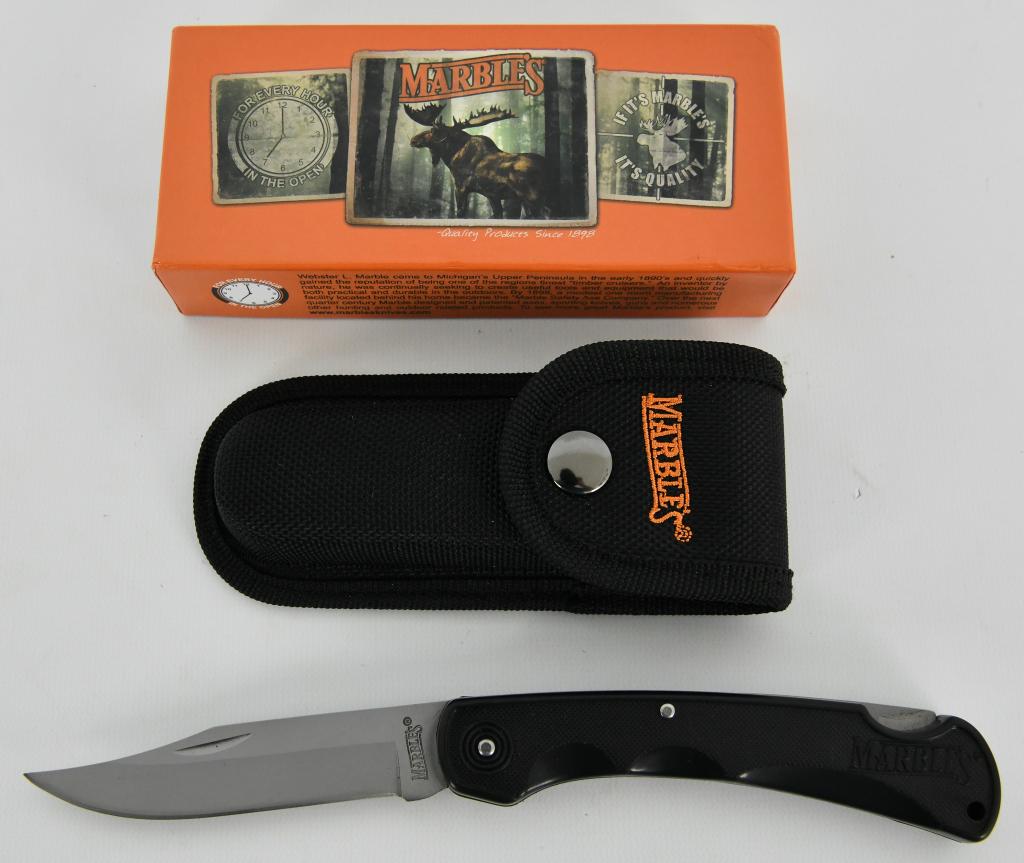Marbles Brushy Mountain Lockback 5" Folding knife: Marbles Brushy Mountain Lockback 5" with Black Synthetic Handles and Surgical Steel Clip Point Plain Edge Blade MR310 Comes with heavy duty nylon sheath with pocket strap comes with original box