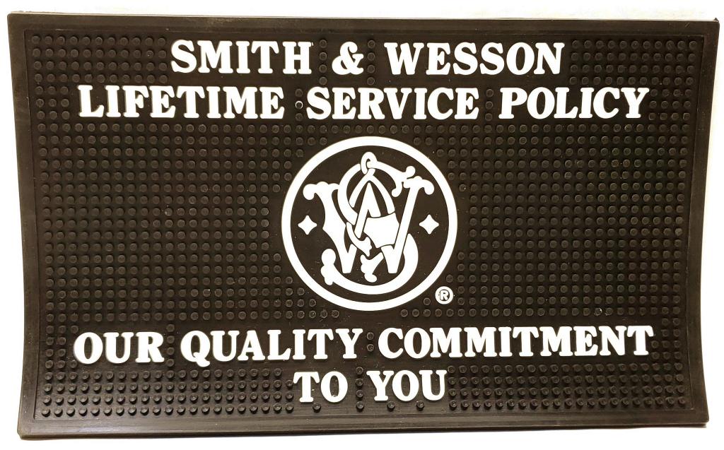 Smith & Wesson Rubber Dealer Counter Mat NEW NEW: - super heavy knub Black Counter mat approx 14.5x9" great for gun cleaning, or other small intricate projects with great rubber to hold those nuts and bolts from sliding off the table: "SMITH & WESSON