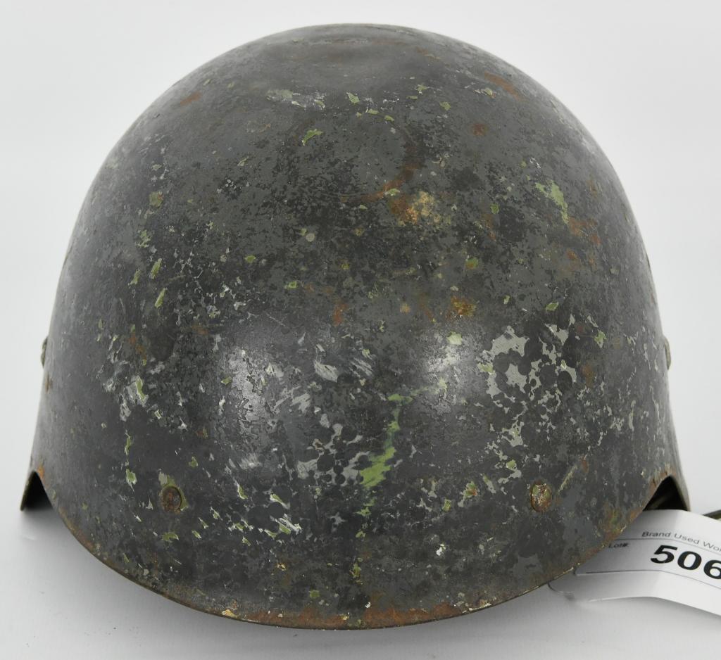 WWII Military Helmet No brim Leather Liner: This Helmet was a tough one for me to attempt to determine, this Military helmet has no brim, has the German or Soviet style "bucket" helmet, weighs approx 2 pounds has the original leather liner, and