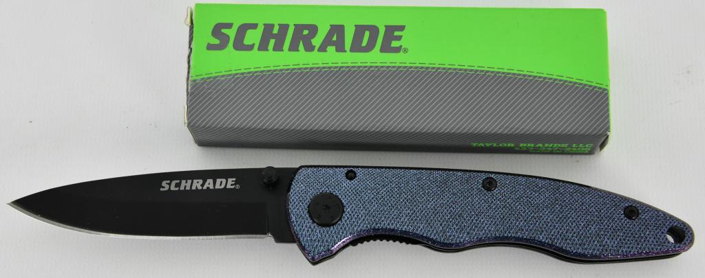 Schrade Folding Pocket Knife New in Box: new in box is a Schrade SCH401LALC pocket folding knife - black ceramic drop point blade with dual thumb studs. Multi Color carbon fiber handles. Lanyard hole. Black finish stainless pocket clip. Blad