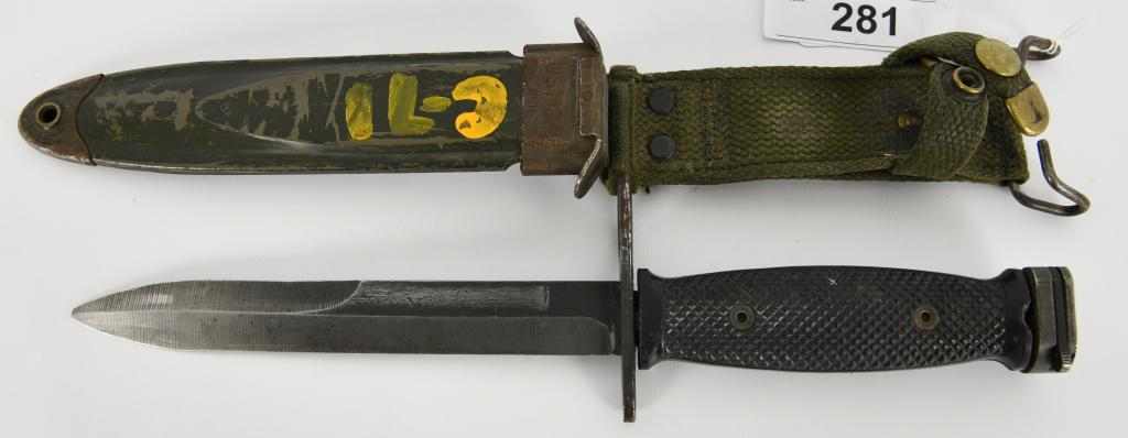 US M8A1 bayonet with scabbard: US M8A1 bayonet with scabbard The bayonet is in good to very good condition with an overall length of 11 ¾" and a 6 ¾" blade. The OD green metal scabbard is marked, "PWH"