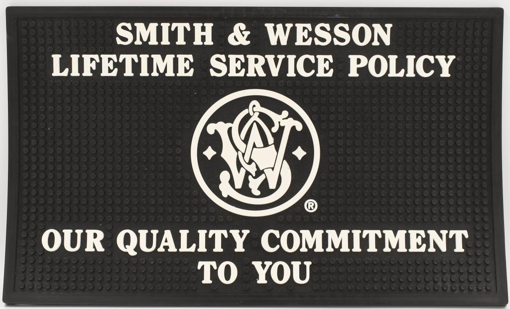 Smith & Wesson Rubber Dealer Mat: super heavy knub Black Counter mat approx 14.5x9" great for gun cleaning, or other small intricate projects with great rubber to hold those nuts and bolts from sliding off the table: "SMITH & WESSON L