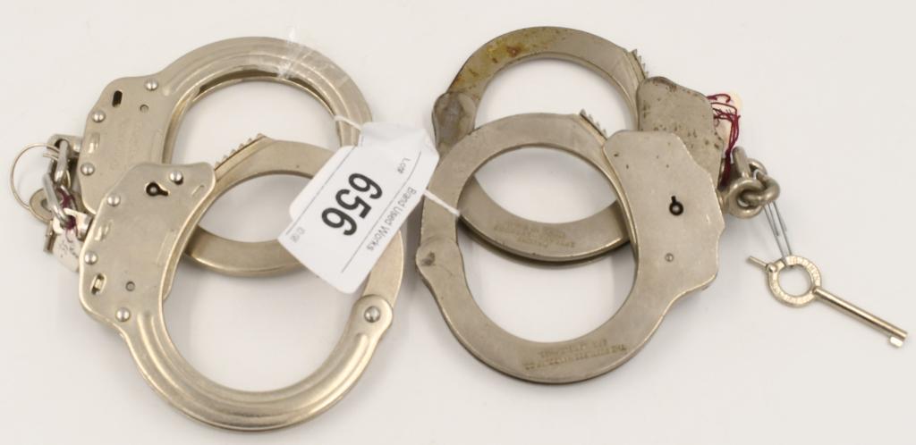 (2) sets of Handcuffs / Wrist Constraints with: Keys Kyung Chang & Peerless; One Set shows Kyung Chang Handcuffs with the Key showing Kyung Chang, material Stainless 2.3T / weight 280g (±20) / shape simple and round design for safety embossing typ