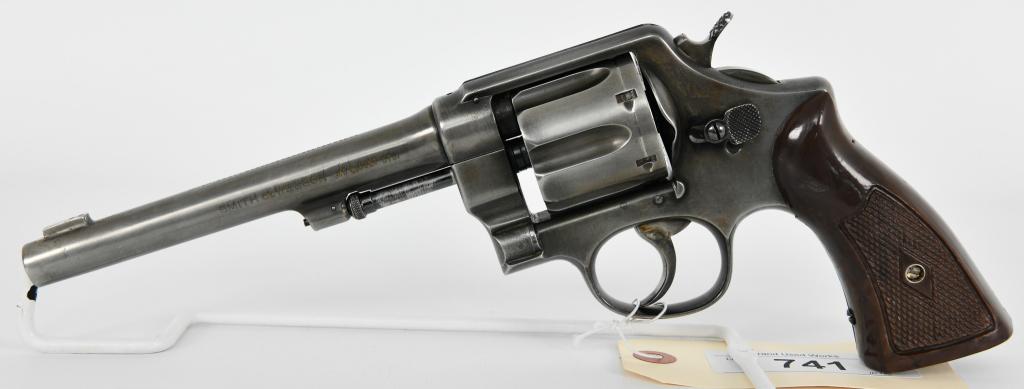 Smith & Wesson Double Action Revolver .45 L Colt: Up next We Have a Smith & Wesson Double Action Revolver Chambered in .45 Long Colt, 6 1/2" Barrel, Unsure of the Model, Looks like a Victory, Serial # 67693, Butt has a hole for a Lanyard Ring, With W