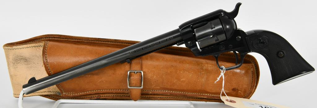 Colt Single Action Buntline Scout Revolver .22 LR: Up Next We Have a Nice Colt Single Action Buntline Scout Revolver Chambered in .22 LR, It Has a 9 1/2" Barrel, Serial # 59019F and Dates to 1959. It Comes With a Nice Leather Holster, Overall in Excel