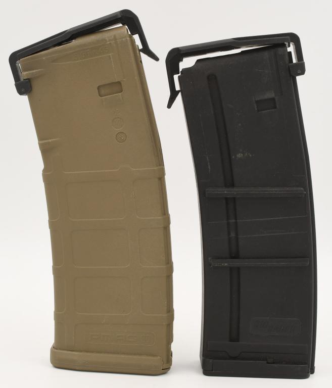 (2) 5.56x45 Polymer Magazines w/cover- one is: Desert Tan with black cover PMAG 30 GENM2 MOE AR/M4 , the other Magazine is a SIG SAUER polymer AR/M4 Mag, black and is 30 round and comes with PMAG Impact & Dust Cartridge-Protecting Cover