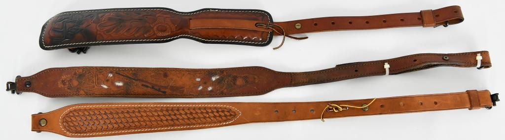 Lot of 3 Vintage Brown Leather Gun Slings: Lot of 3 Vintage Brown Leather Gun Slings, This Lot Includes 1 Deer Design Padded Leather Sling Marked 9420, 1 Rifle Design Leather Sling With Saddle Ring Clips, & 1 Basket Weave Design Brown Leather 