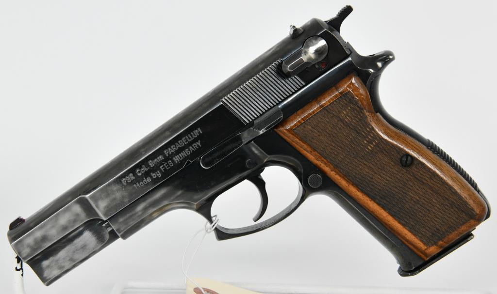Hungarian FEG Model P9R Semi Auto 9MM: Up Next We Have a Hungarian FEG Model P9R Which is a Browning Hi Power clone manufactured in Hungary circa 1970s with original blue finish and checkered walnut grips. Fixed sights, 13 round magazine c