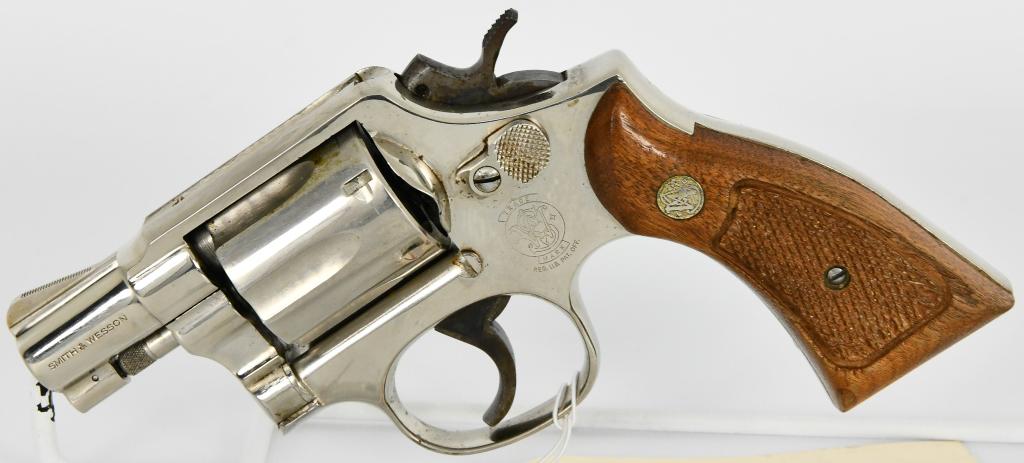 Smith & Wesson Model 10-7 Revolver .38 SPL: Up Next we have a Snub Nose Smith & Wesson Model 10-7 in Nickel Finish, Chambered in .38 S&W Spec. , 2" Barrel, Square Butt, Wood 2 Panel Medallion Grips, Serial #18D3799 Overall in Great Condition.