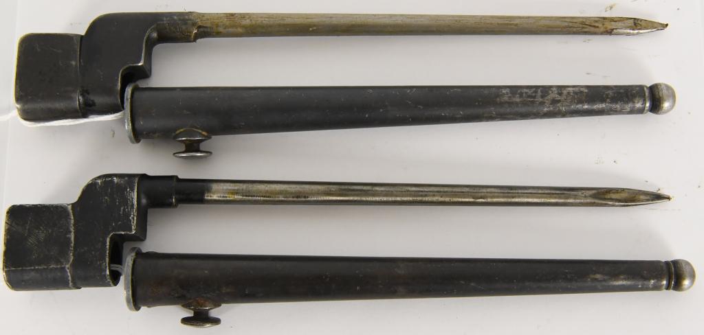 (2) WORLD WAR II LEE ENFIELD 303 PIG STICKER BAYO,: (2) WORLD WAR II LEE ENFIELD 303 PIG STICKER BAYONET, with Scabbard, one is marked No 4 MK II N 67 I see an ND, the scabbard doesnt show any information, the other bayonet shows lightly the 4 then and
