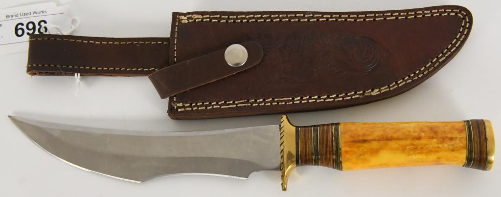 Custom Fixed Blade Hunting Knife w/ Leather Sheat: Custom Fixed Blade Hunting Knife with Leather Sheath, overall length is 12.5" comes with single edge blade, pointed sharp tip, brass bolster and tip, decorated orange color bone style handle heavy dut