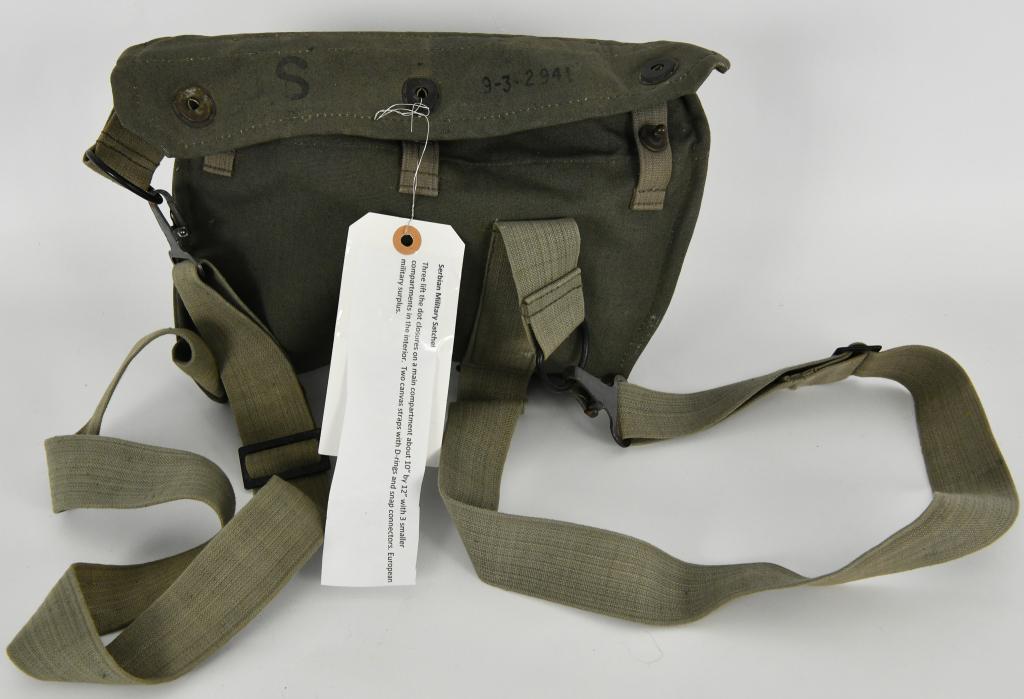 Serbian Military Satchel: Three lift the dot closures on a main compartment about 10" by 12" with 3 smaller compartments in the interior . Two Canvas straps with D-rings and snap connectors. European military surplus