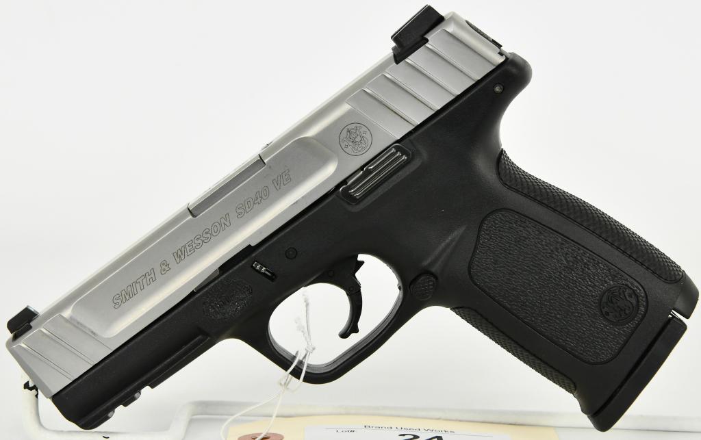 Smith & Wesson SD40 VE Semi Auto Pistol .40 S&W: Up Next We Have a Smith & Wesson SD40 VE Semi Auto Pistol Chambered in .40 S&W, It Comes With One Magazine, Polymer Frame and Stainless Slide, Two-Tone, SDT- Self Defense Trigger for optimal consisten