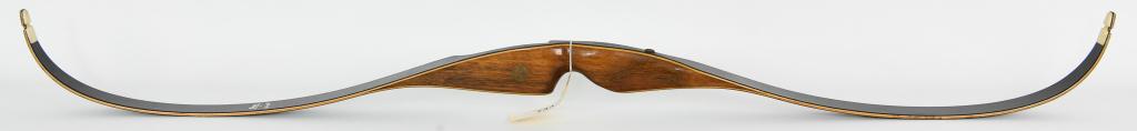 Bear Archery Grizzly Recurve Bow 58" 45#: Lot contains a nice pre owned Bear Archery Grizzly Recurve Bow 58" 45# model KR56820. The Bear Grizzly is a most popular 1-piece bow. It is the same design since it was last changed in 1964. Priced to