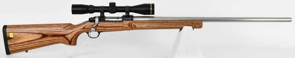 Ruger M77 Mark II Target Bolt-Action .220 Swift: Up Next is a Pristine Ruger M77 Mark II Varmint Target Bolt-Action Rifle Chambered in .220 Swift, 26" Heavy Barrel, 4 Rounds Capacity, Brown Laminate Target Stock, Grey Barrel, and Topped With a Nice 