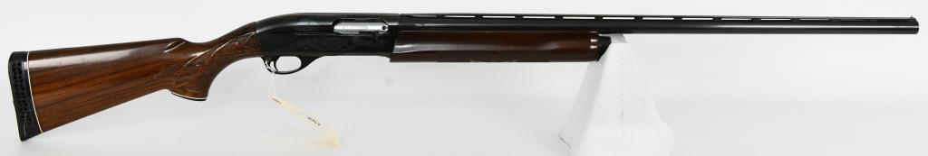 Remington Model 1100 Magnum 12 GA Auto Shotgun: Up next we have a Pre-Owned Remington Model 1100 Magnum Semi Auto 12 Gauge Shotgun chambered for 3" Shells, 30" vent rib barrel with front bead sight, Serial # P095109M Chambered in Full Choke. Overal