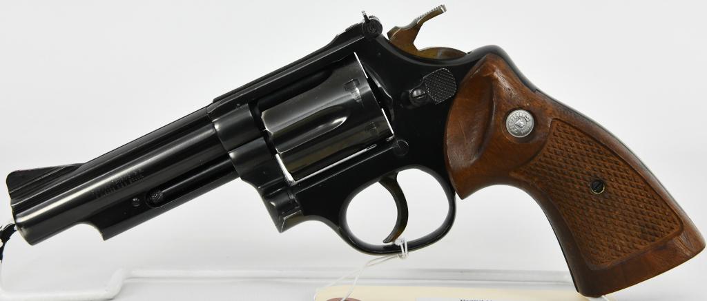 TAURUS MODEL 66 DOUBLE ACTION REVOLVER .357 MAGNUM: Up Next We Have a Taurus Model 66 Double Action Revolver Chambered in .357 Magnum, 4" Barrel, 6 Round Cylinder, Fixed Front/Adjustable Rear Sights, Checkered Wood Grips, Serrated Trigger, Blued Finish