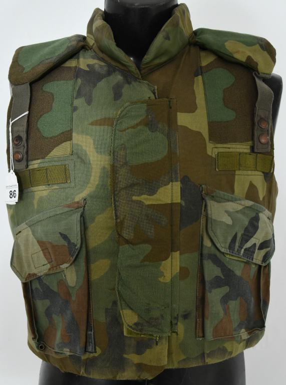 USGI issued Fragmentation Protective Vest Body: Armor; Ground Troops - sz Medium Chest from 37-41 inches, Nato size 7080/9404 this Protective vest comes to you in woodland camo, has molle straps, pockets and more; refer to pictures, this vest comes