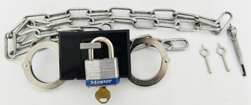 CTS Thompson Blue Box Cover with handcuffs and: belly chain; Made of reinforced ABS and steel. Blue Box Transport Systems: safe, strong and tough. CTS Thompson Blue Box systems keeps handcuff keyholes covered for top security during transport or de