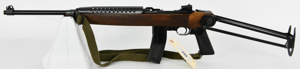 Universal M1 Carbine Paratrooper Semi Auto Rifle: Up Next We Have a Universal M1 Carbine Paratrooper Semi Auto Rifle Chambered in .30 Caliber, It Comes Equipped With a Heat Shield, Under Folder Paratrooper Stock, Pistol Grip, Nylon Sling, and One Mag