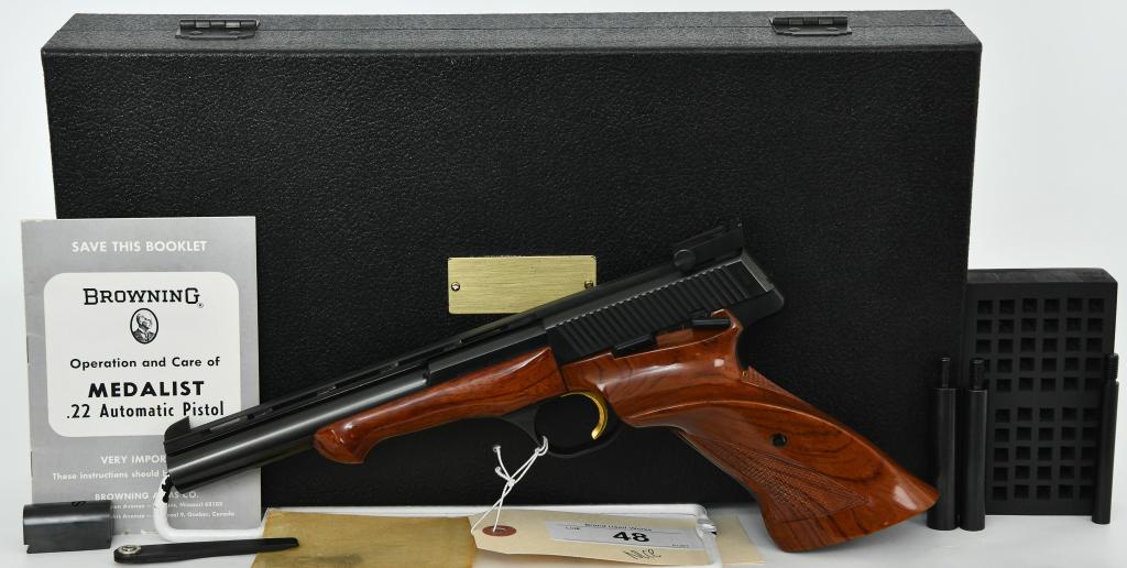 Pristine 1966 Belgium Browning Medalist Target: WOW! Feast your eyes on this Absolute Beauty! Here We Have a Pristine 1966 Belgium Browning Medalist Semi Auto Target Pistol, 6 3/4" Ventilated Heavy Barrel, and Comes in The Velvet Lined Case Complet