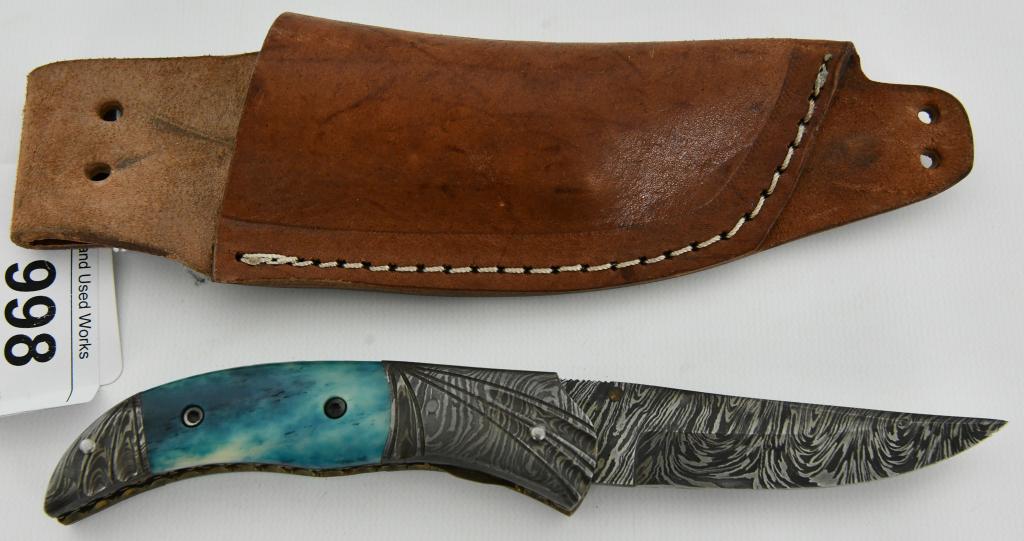 Folding Pocket Knife w/Damascus style w/sheath: Lot contains one Folding Pocket Knife with Damascus design blade, which measures approx 3" blade, very sharp and pointed tip with blue bone style handle, comes with a leather sheath