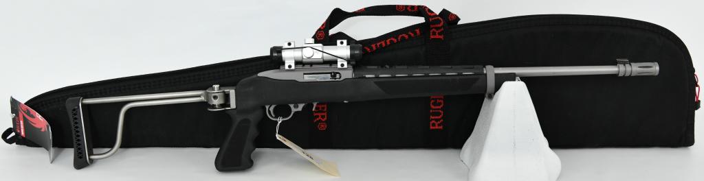 Ruger 10/22 Semi Auto Rifle Paratrooper Tactical: Look at This Ruger 10/22! Here We Have a Ruger 10/22 Semi Auto Rifle Chambered in .22 LR, and Equipped With a Butler Creek Folding Paratrooper Stock Kit, Fitted With a Flash Hider, and Topped With a M