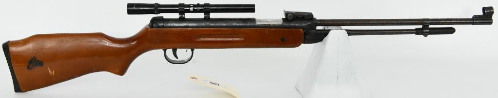 Chinese Under-lever Cocking Pellet .177 caliber: This is a Chinese manufactured and unbranded .177 caliber, spring-piston, under-lever cocking pellet rifle with a wood stock. Optics include, 4x15 with great cross hairs, fully adjustable rear sights,