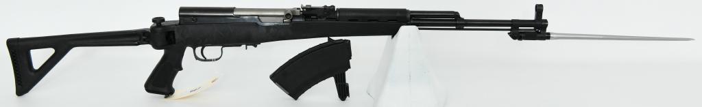 Norinco SKS Sporter Folder W/ Bayonet 7.62X39: Up next is a Chinese Norinco SKS Sporter Semi Auto Rifle chambered in 7.62X39 and comes furnished in a synthetic pistol grip folding stock, Detachable Tapco High Capacity Magazine, folding bayonet, cl