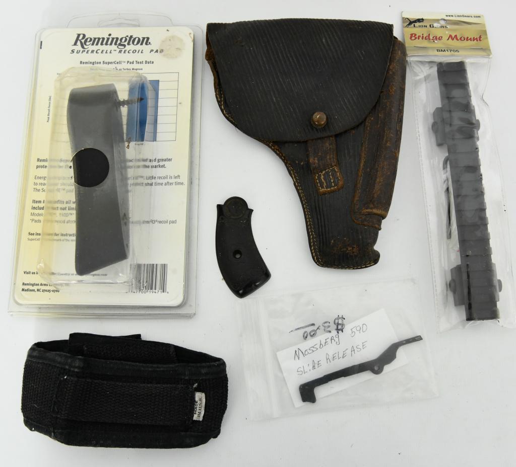 Misc accessory Lot: Remington supercell recoil pad new in the package, Mossberg 590 slide release, LionGears Bridge Mount BM1705 to customize your own rail system, one side of a Iver Johnson Grip in nice condition with t