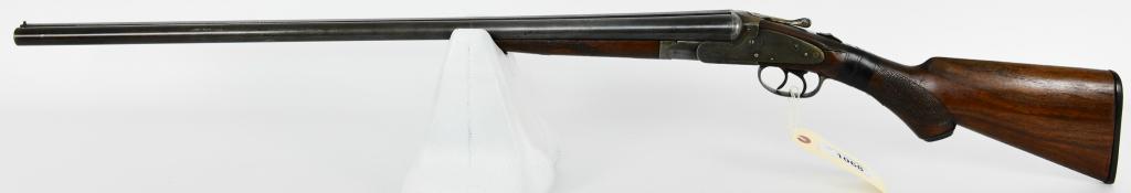 Vulcan Side By Side 20 Gauge Shotgun: Up Next We Have an Old Vulcan Side by Side Shotgun Chambered in 20 gauge, Lock up is Loose, 28" Solid Rib Barrels, Front Bead Sight, Crack in Stock at Wrist, Overall in Poor ondition, Wall Hanger Only