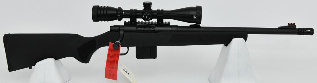 Mossberg MVP Series 5.56 NATO Rifle: Up Next is a Mossberg MVP Series Rifle Chambered in 5.56 NATO, Comes With One Magazine, and Topped With a Redfield Battlezone TAC-MOA 3-9X42 Scope With Lens Covers, Equipped With a Birdcage Flash Hide
