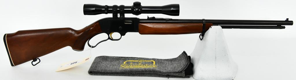 Mossberg Model 402 Palomino AC KRO GRUV .22 S,L,LR: Mossberg Model 402 Palomino AC KRO GRUV lever action rifle chambered in .22 S,L,LR, barrel measures approx 20.5" in length, Gold Trigger, Overall in Excellent Condition and Topped With a Bushnell Bann
