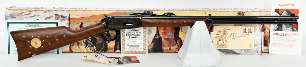 Winchester 1894 Chief Crazy Horse .38-55 Commem.: Up Next We Have a Beautiful Winchester Model 1894 Saddle Ring Chief Crazy Horse Commemorative lever-action rifle chambered in .38-55 Win. A 24-inch barrel is adorned with standard iron sights. The cas