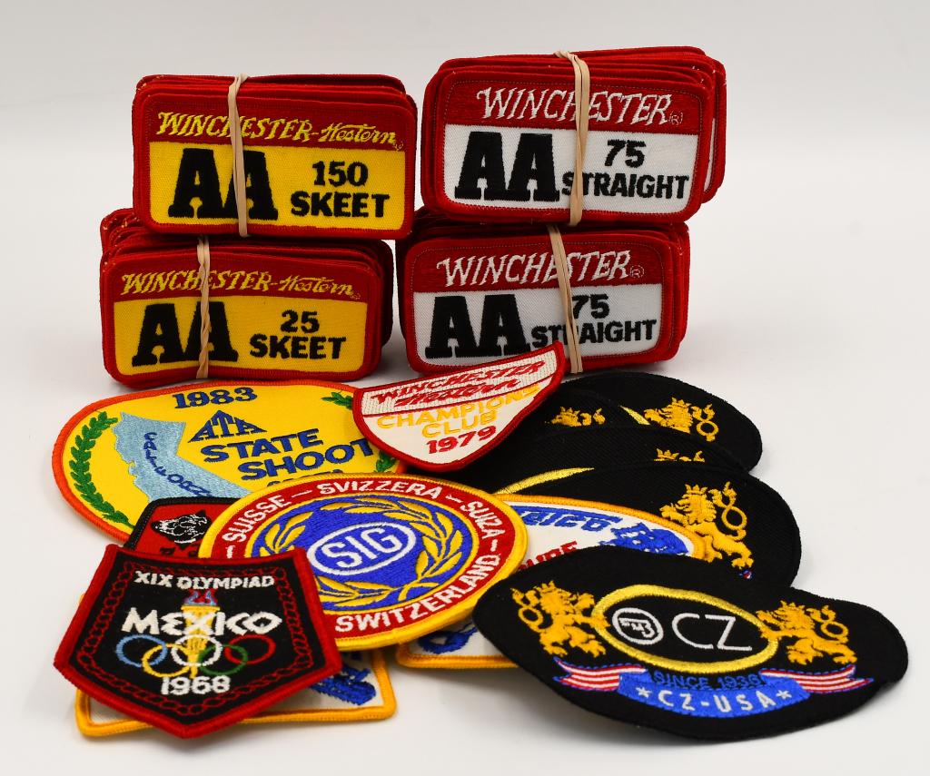 Large Lot of Winchester AA Sew-On Patches: Large Lot of Winchester AA Sew-On Patches, Includes Some , Winchester AA 25 Skeet Patches, Winchester AA 75 Straight Patches, 1983 State Shoot Patch, CZ-USA Patch, & A Sig Patch & More