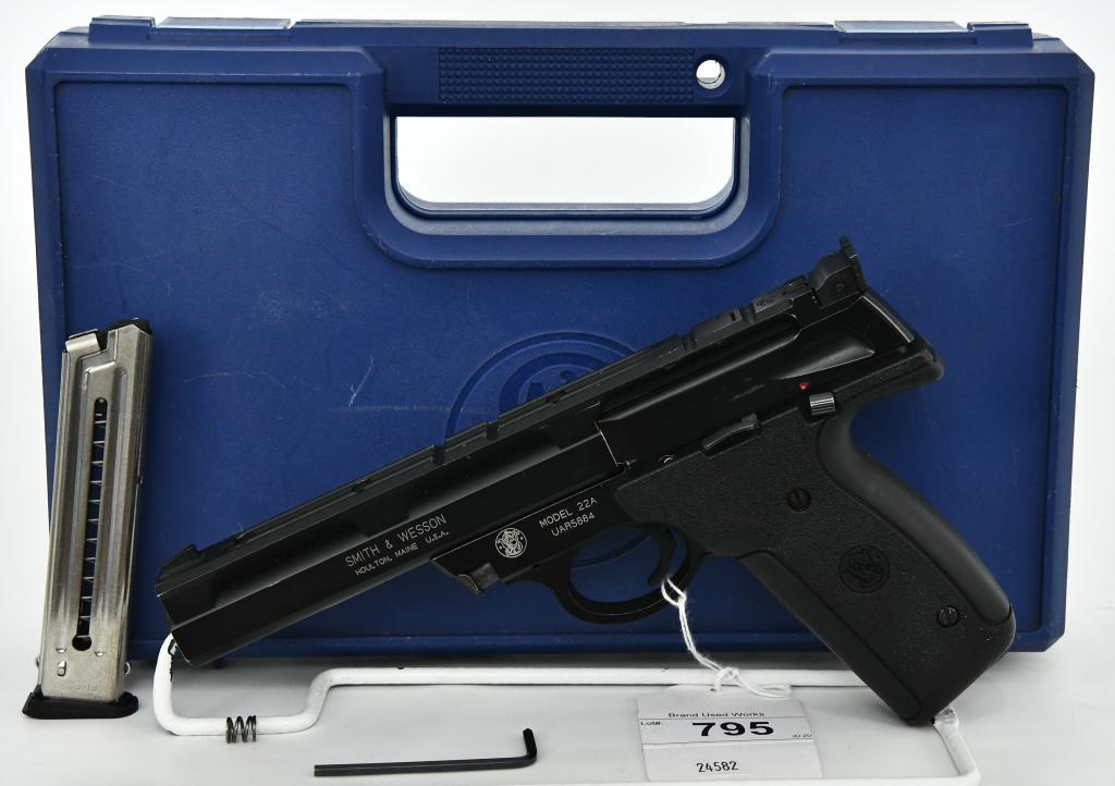 Smith & Wesson Model 22A Semi Auto .22 Pistol: Here we have a fun plinker, Smith & Wesson Model 22A Semi Auto Pistol is chambered in .22 LR and comes with Two Factory Magazines. Overall in Excellent Pre-owned Condition, Topped With a Rail, Optics