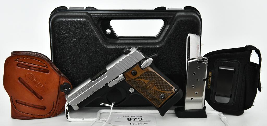 SIG Sauer P938 SAS Semi Auto Pistol 9mm: Up Next We Have a SIG Sauer P938 Semi Auto Pistol Chambered in 9mm, With Wood Grips, With Two Magazines, and Two Holsters, The Leather Tagua Appears New, and it Comes in a Plastic Hardcase. Overall Ap