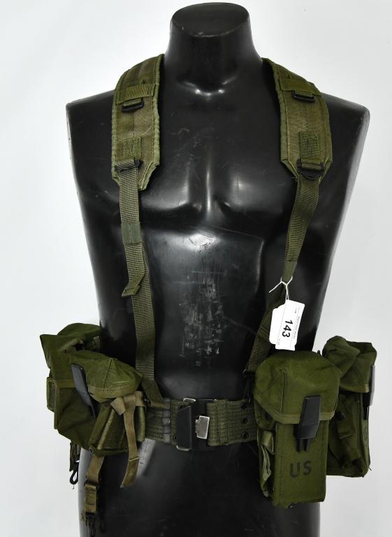 U.S. Military Individual Suspender Equipment Belt: LC-1 with M16 Ammuntion cases (3) and (2) small arms ammunition 30- round magazine (M-16) rifles #8465-464-2084 in super condition. all pouches are marked US, the suspenders come with the Military # 8