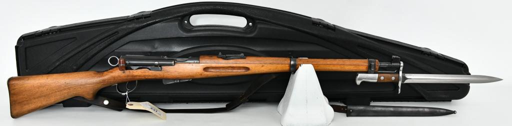 Swiss K1911 Carbine Straight Pull Rifle 7.5x55: Up Next We Have a Swiss K1911 Carbine Straight Pull Rifle Chambered in 7.5x55, Bakelite Charging Handle, Comes With Leather Sling, Bayonet With Sheath, and in a Padded Hardcase. Split at Wrist, See Pi