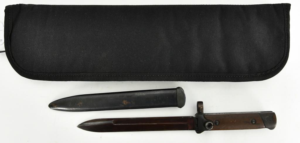 Italian M91/38 Carcano Carbine Folding Bayonet: Up Next We Have a Cool Italian M91/38 Carcano Carbine Folding Bayonet & Scabbard. The letters MA within a cartouche, indicating the bayonet was manufactured at Milan Arsenal. The folding mechanism of 